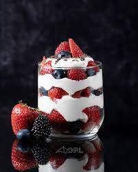 A delicious bowl of fresh berries and cream